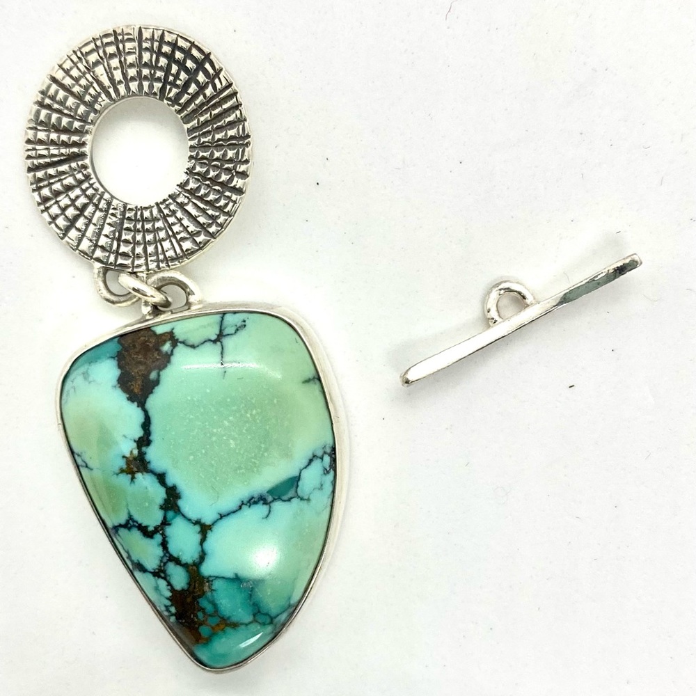Sterling Silver and Turquoise pendant with toggle clasp.